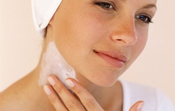 apply a cream to rejuvenate the skin of the neck and décolleté
