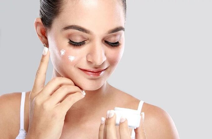 Before using the massager, apply the cream to your face